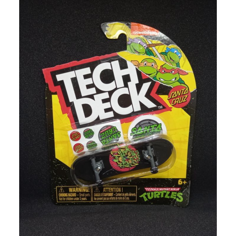Tech Deck Fingerboard - TMNT - Santa Cruz Teenage Mutant Ninja Turtles (TMNT) - Mini Skateboard