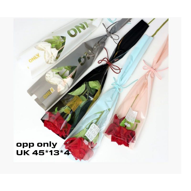 

50 lembar plastik pembungkus bunga 1 tangkai