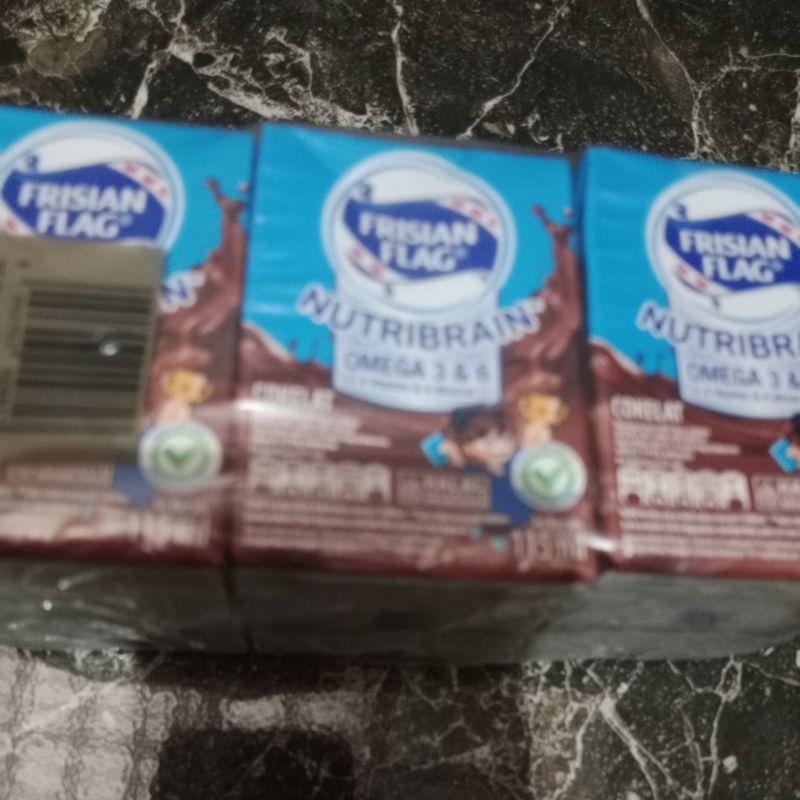 Susu kotak Frisian flag isi 6 kotak