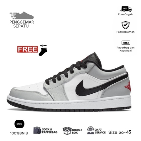 Sepatu asli dari Nike Air Jordan 1 low cut dengan kombinasi warna abu-abu, hitam, dan putih.