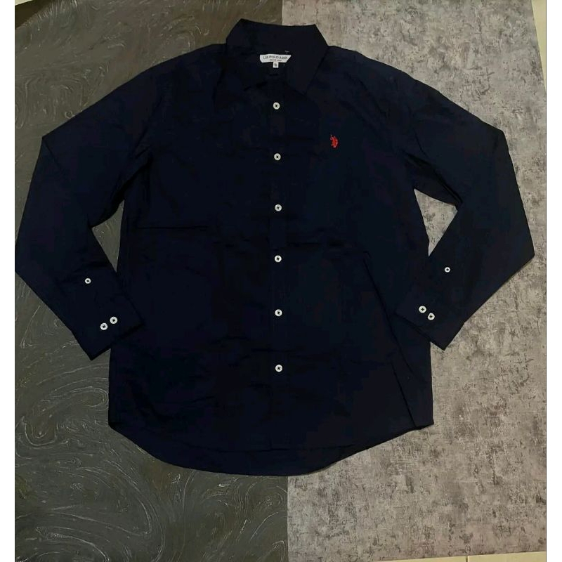 kemeja polo uspa