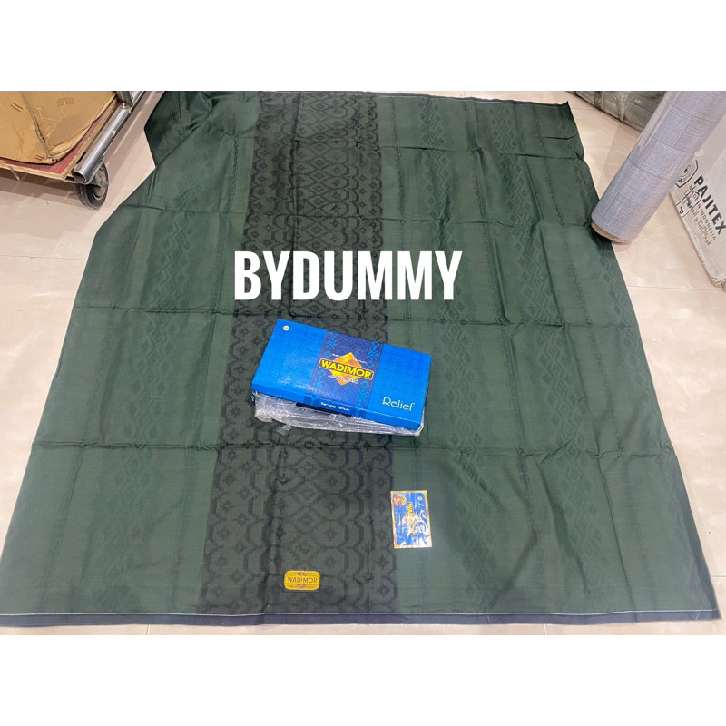 

Sarung Wadimor Relief warna hijau tua grosir murah dus luar agak rusak