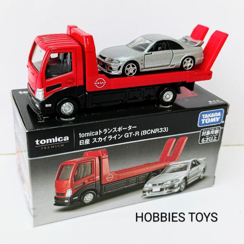 Tomica Premium Nissan Skyline GT-R R33 (BCNR33) with Transporter Towing Truck