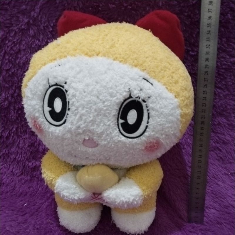 boneka kuning dorami