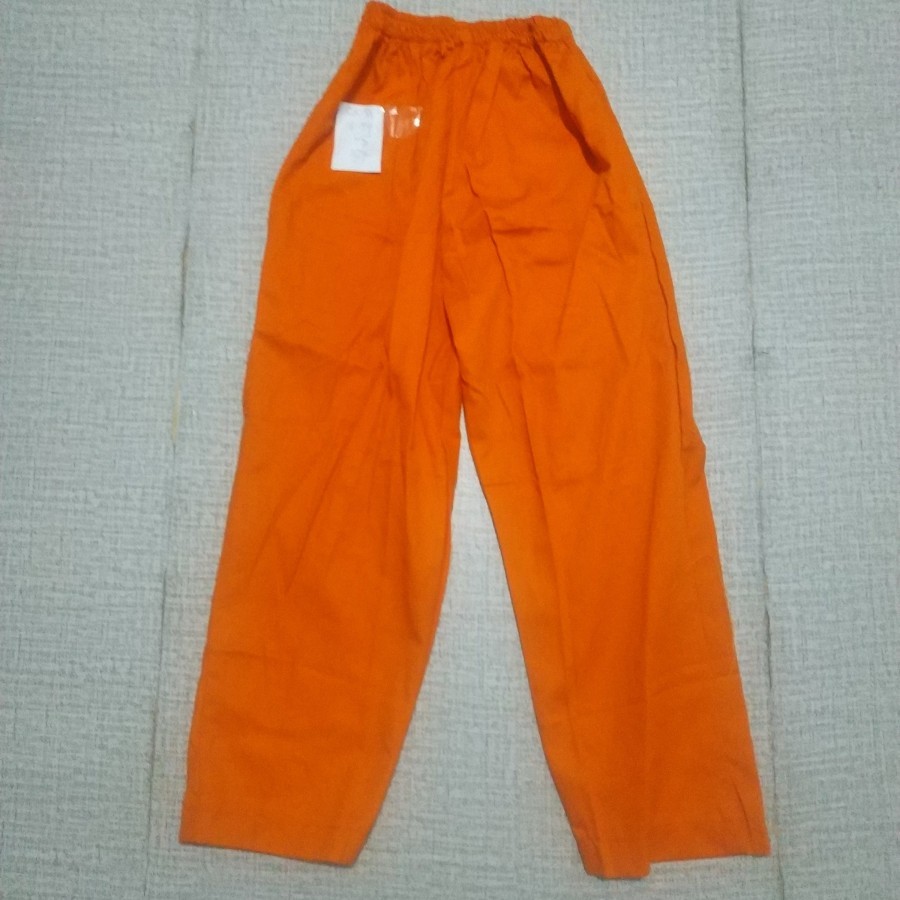 preloved celana orange sekolah/cx31