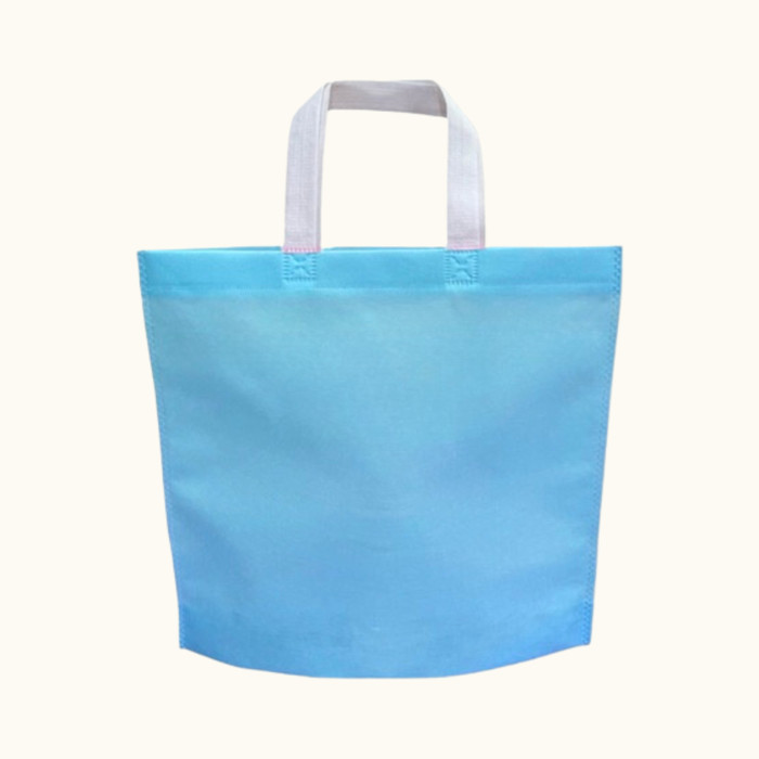 

Tas Goodiebag Tebal Spunbond gramasi 75 uk 35x33x8 model tali lipat bawah