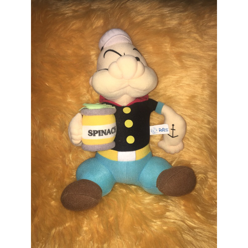 Boneka Popeye bawa spinach