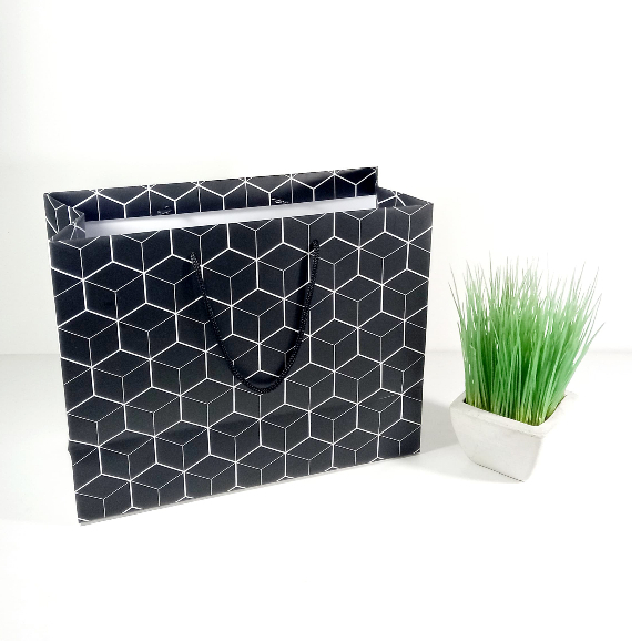 

Paperbag Motif Jala Uk. 32,5 x 25 x 14 cm