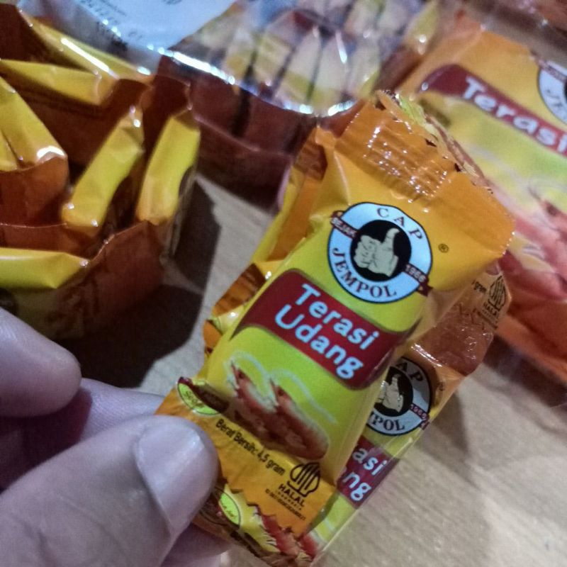 

ECER DAN GROSIR TERASI UDANG CAP JEMPOL SEJAK TH 1966 TERBUAT DARI UDANG REBON SEGAR @4,5 GRAM