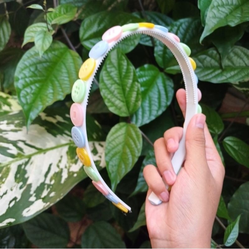 bando kancing bergerigi