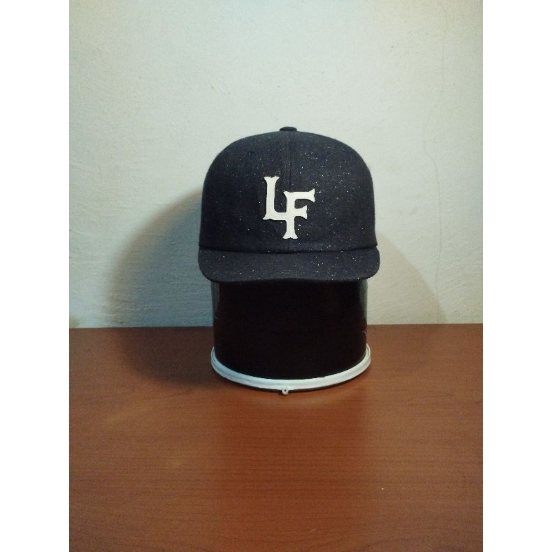 Topi visor pendek Liful Minimal Garment