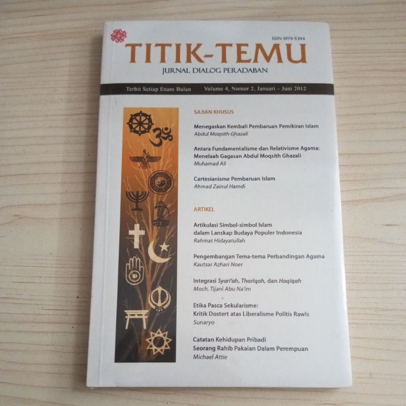 BUKU TITIK TEMU JURNAL DIALOG PERADABAN VOLUME 4 NOMOR 2 2012 SEGEL