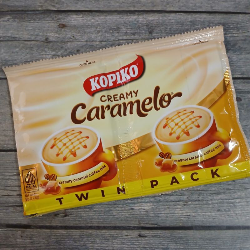 

Kopiko Creamy Caramelo Coffe Mix / Kopi Singapore Nescafe Owl