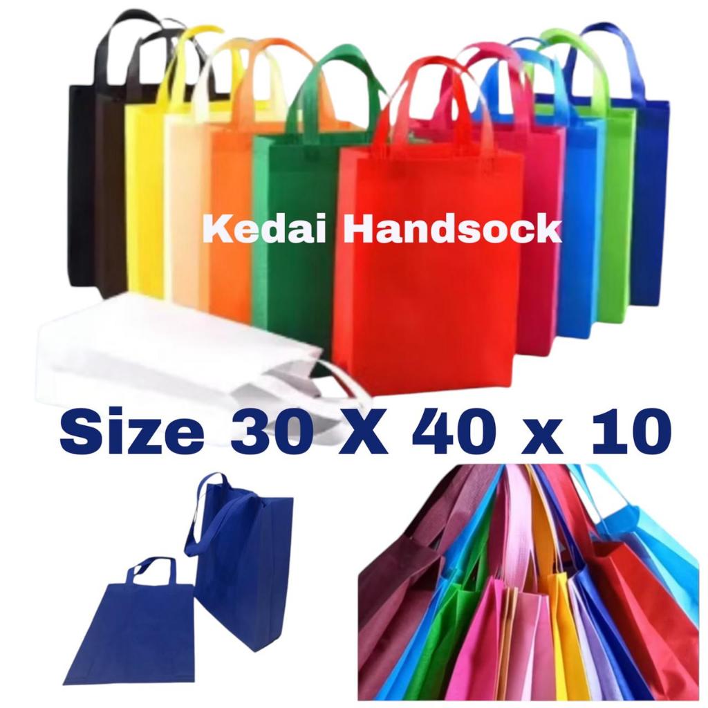 

12 pcs TAS SOUVENIR SPUNBOND STANDING 30 x 40 x 10 TEBAL 75 GSM