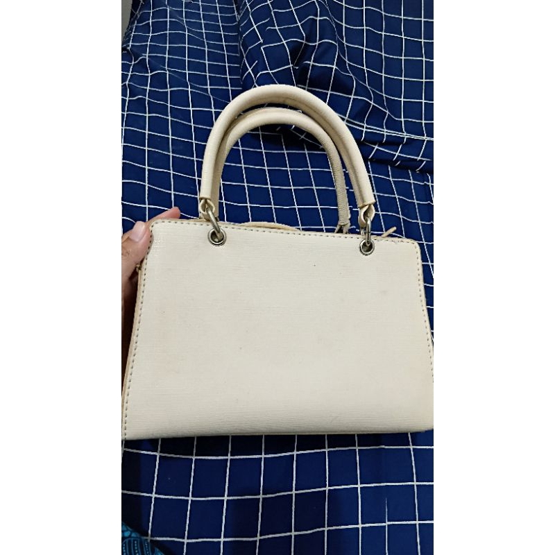 Tas jinjing cream bunga
