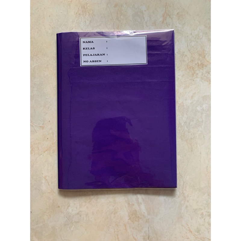 

buku tulis sudah disampul sukung warna ungu dan sampul plastik