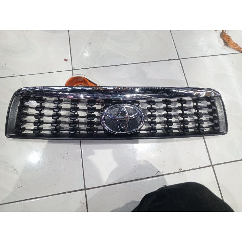 grill Terios 2010-2014 original. grill rush 2010-2014 original