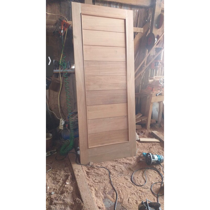 Daun pintu motif minimalis timbul kayu kamper samarinda oven