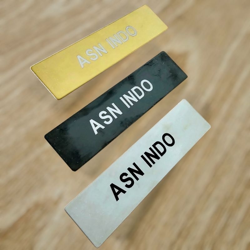 

Papan Nama Laser Titanium Premium