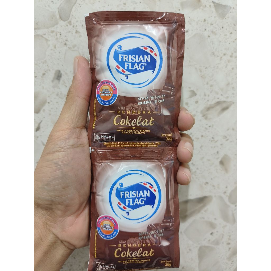 

Susu Kental Manis Rasa Cokelat Frisian Flag Kemasan 1 Renceng isi 6 Sachet