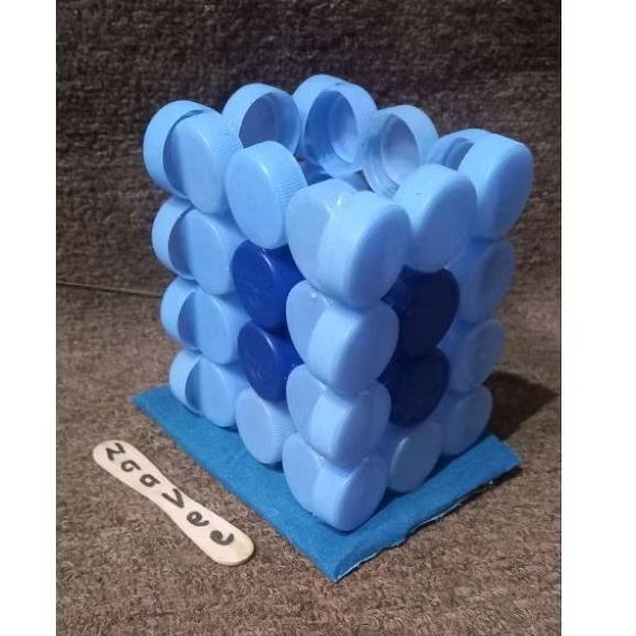 

tempat pensil dari tutup botol bekas kerajinan tangan prakarya dari barang bekas