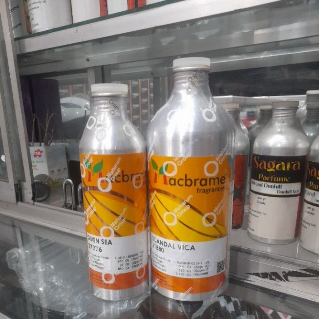 kaleng bekas parfum macbrame 500 ml dan 1kg