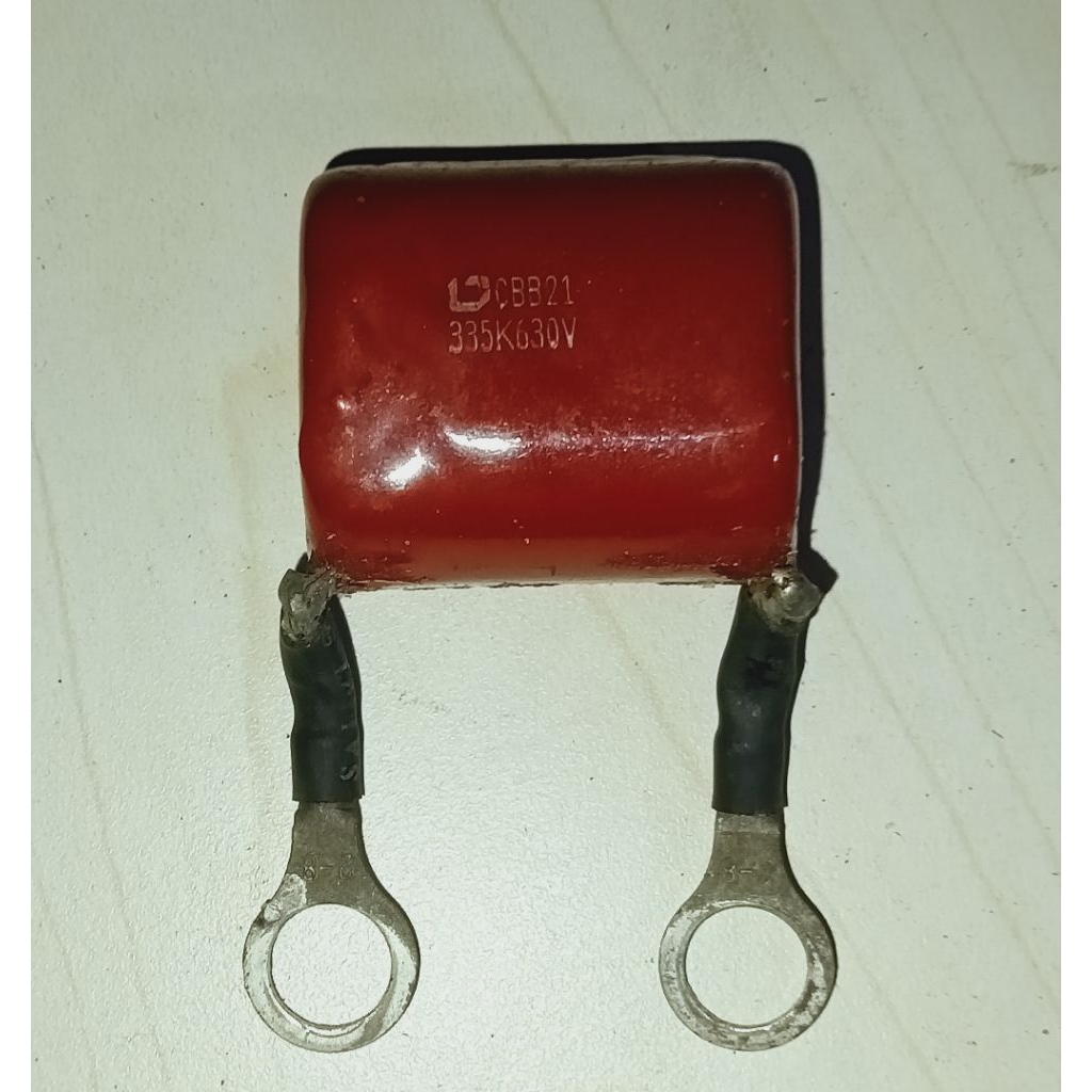 KAPASITOR CBB21 335K630V JARAK KAKI 3CM BEKAS