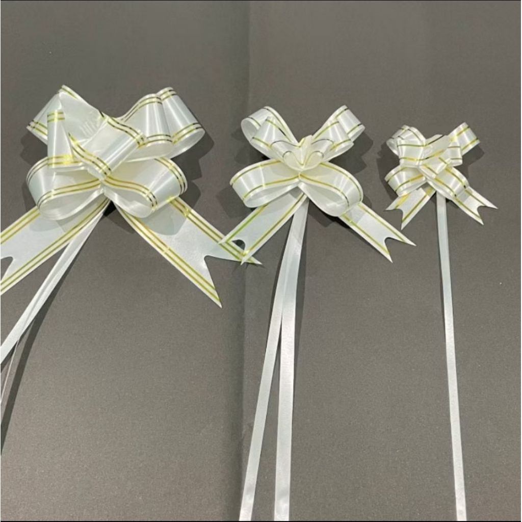 

(Isi 10 pcs) 15 MM Pita tarik liat emas hiasan parcel / pita serut / pita kado list gold souvenir
