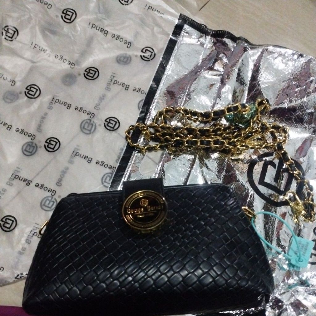 tas geoge bandi motif anyam