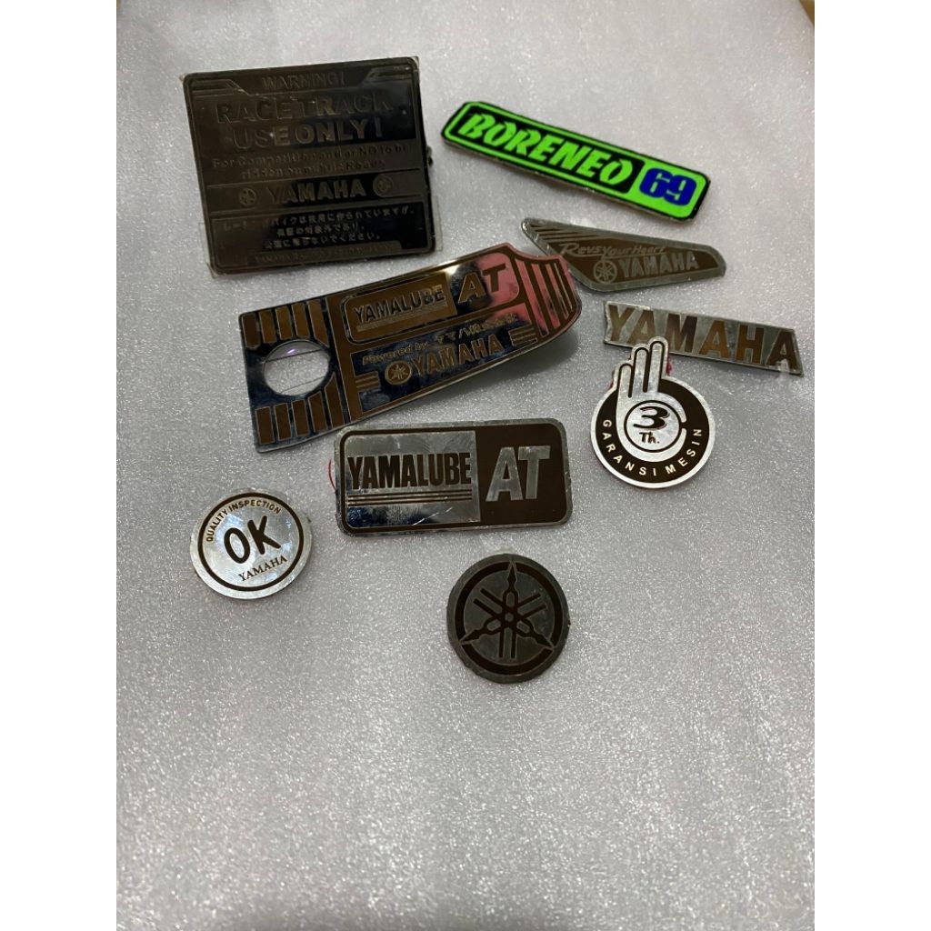 Emblem stainless Yamaha Mio garansi 3 tahun OK yamalube AT emblem model titanium stainless mio sport