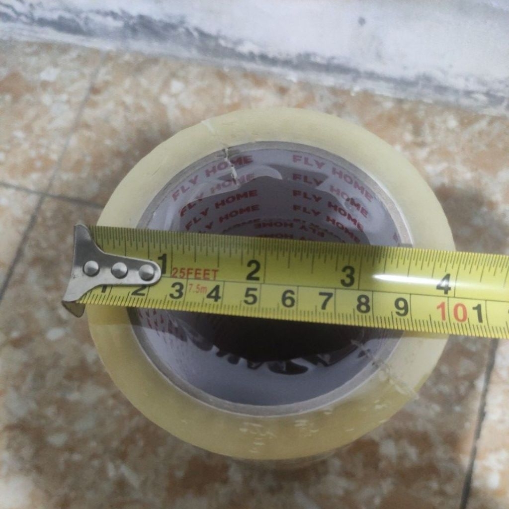 

Fly Home Lakban Bening (45 x 100yard) (Paket 6pcs)