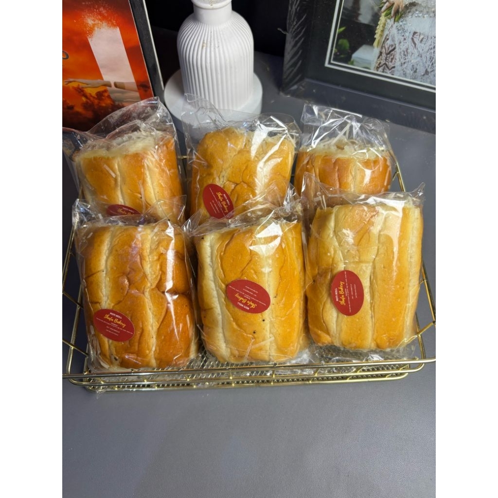 

ROTI ROLL MANIS TOPING KEJU