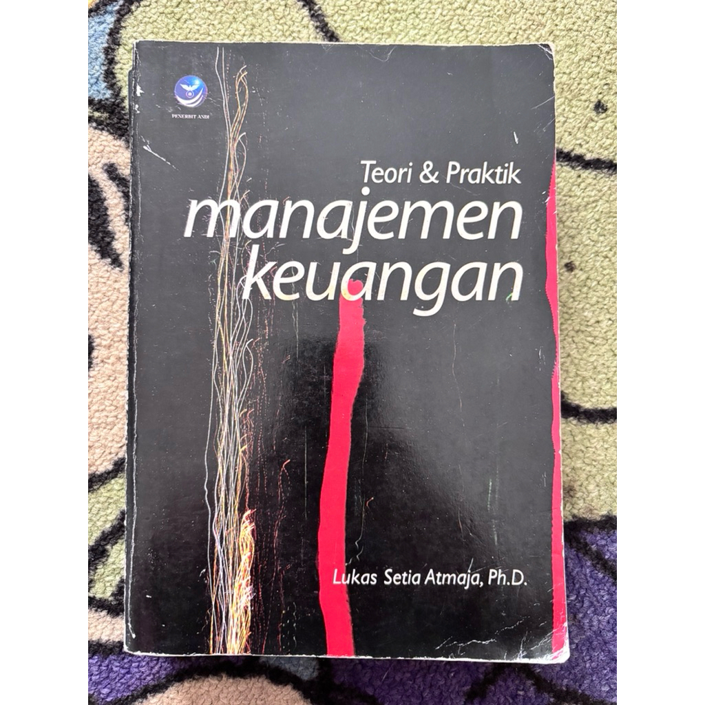 Buku teori & praktik MANAJEMEN KEUANGAN (Lukas Setia Atmaja, Ph.D.)