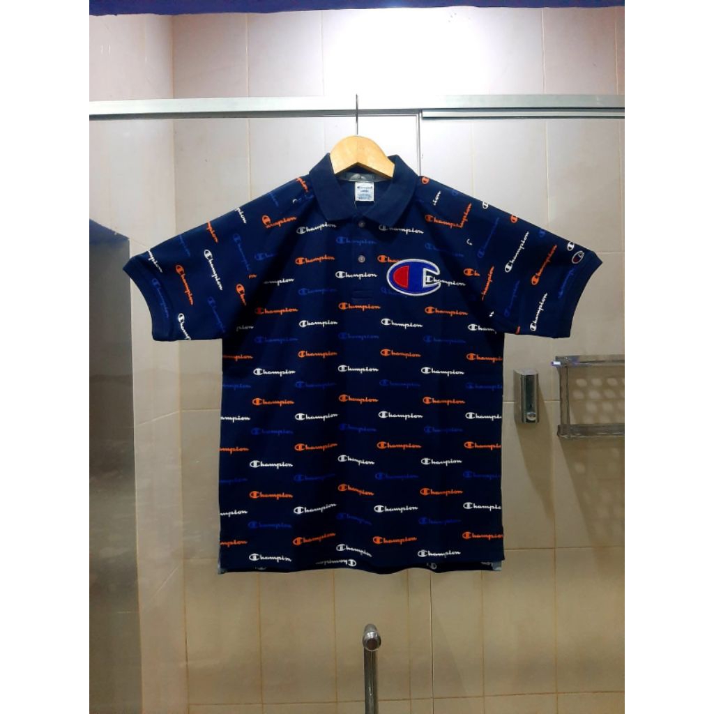 KAOS POLO CHAMPION SHORT SLEEVE LOGO BORDIR NEW EDITION NAVY 100% ORIGINAL