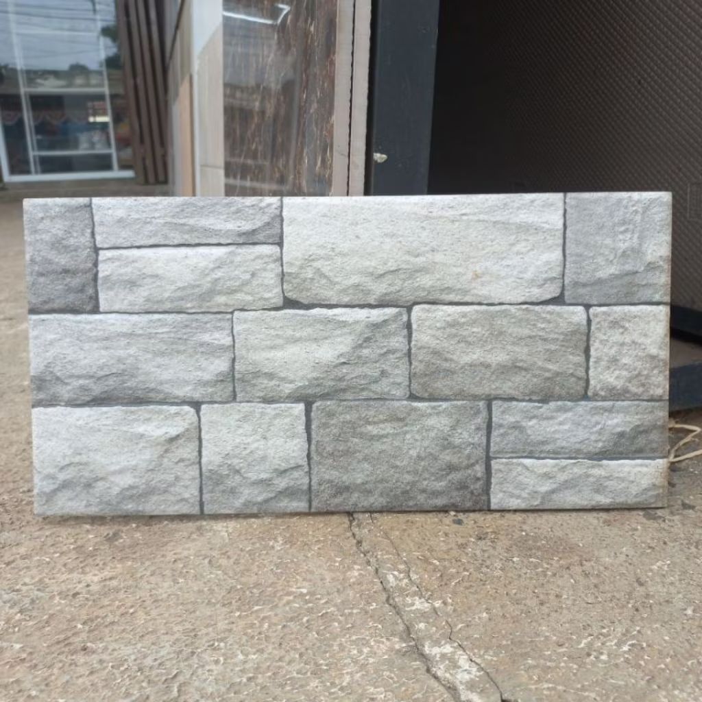 keramik dinding 20x40 batu alam timbul kasar