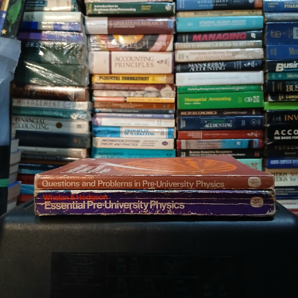 2 buku pre-university physics 1. ueatiins and problems in pre-university phyaics. 2. essential pre-u