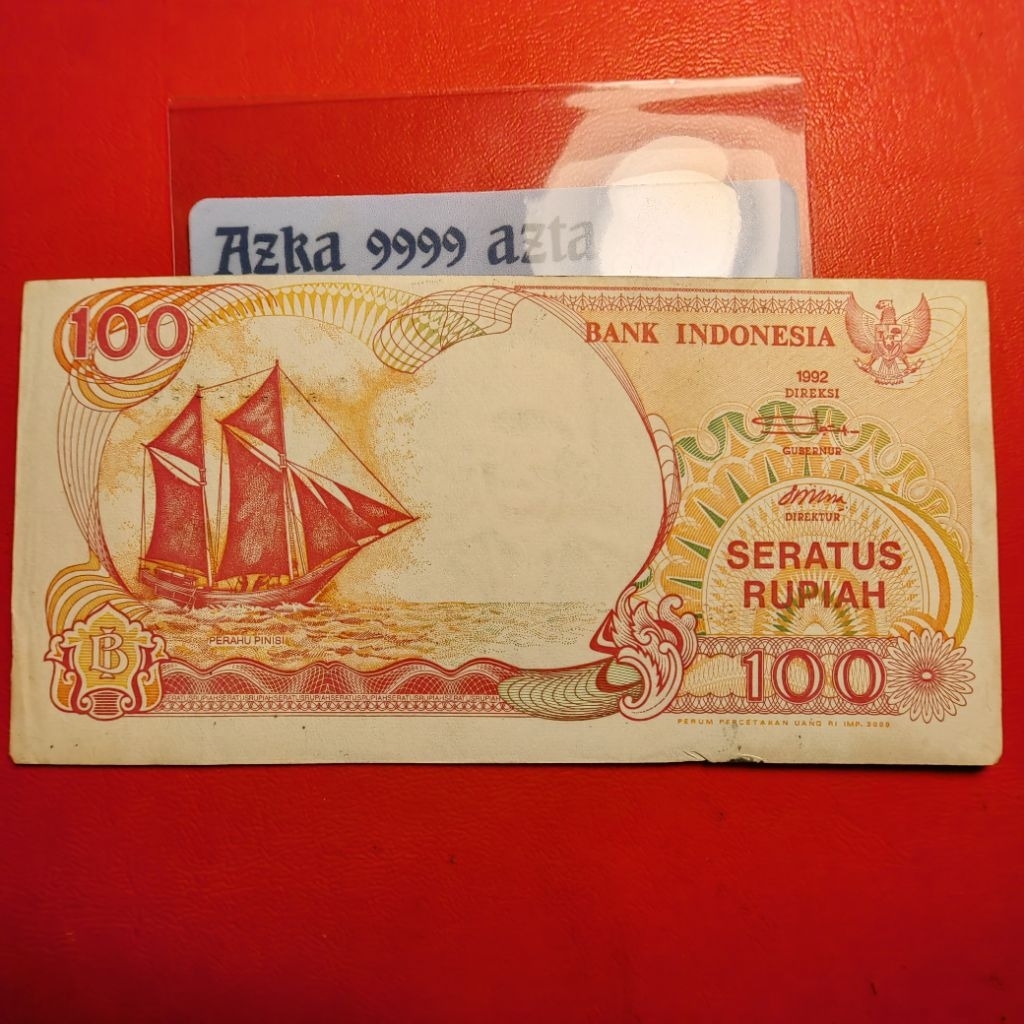 100 rupiah Pinisi cetak geser asli sesuai foto
