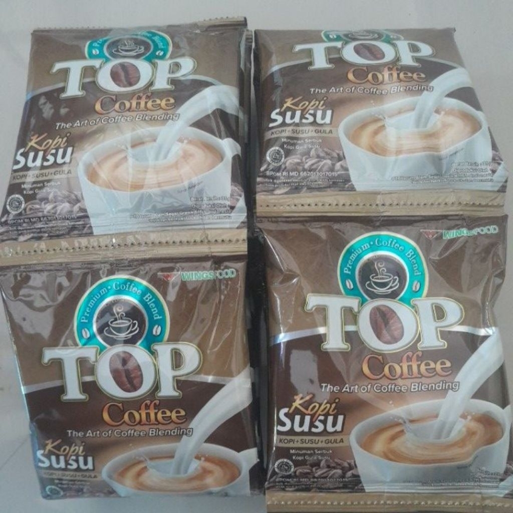

Top Coffe Susu (Kopi + Susu + Gula) 1 Renceng isi 12 Sachet