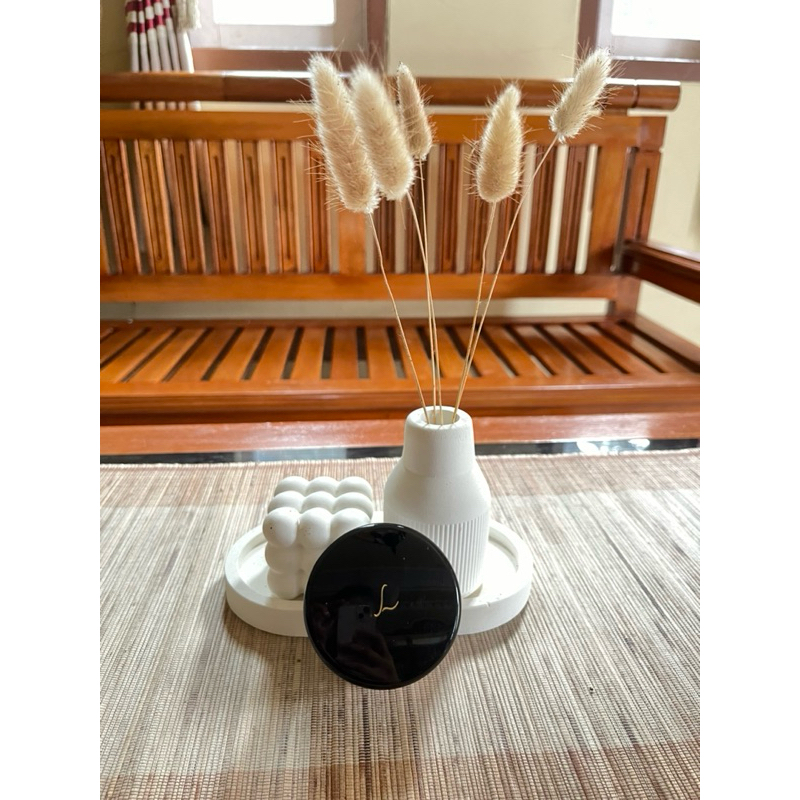 Bedak tabur klinik Larissa