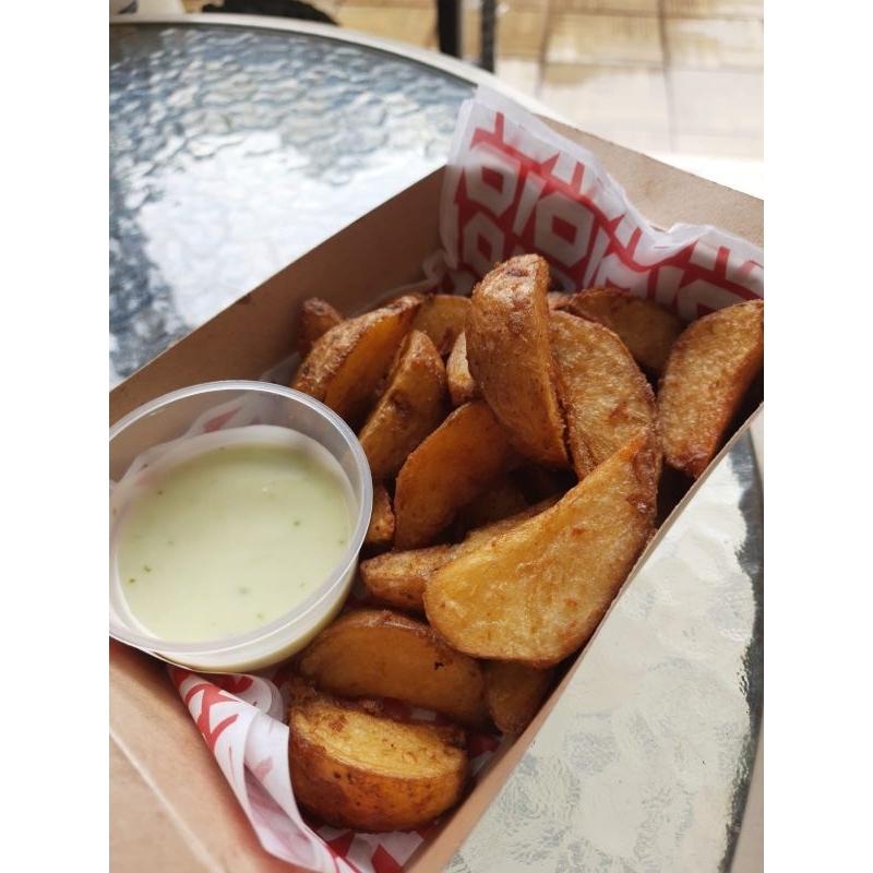 

POTATO WEDGES OLAHAN KENTANG FROZEN BERBUMBU