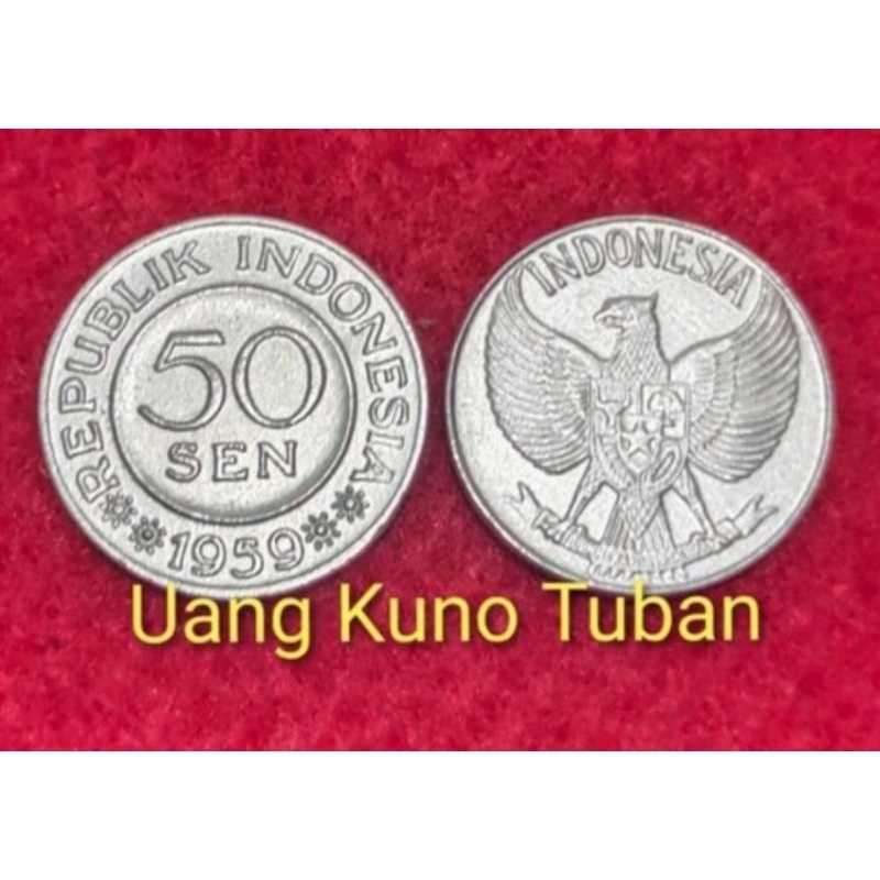 Uang kuno 50 sen garuda . Koin 50 sen
