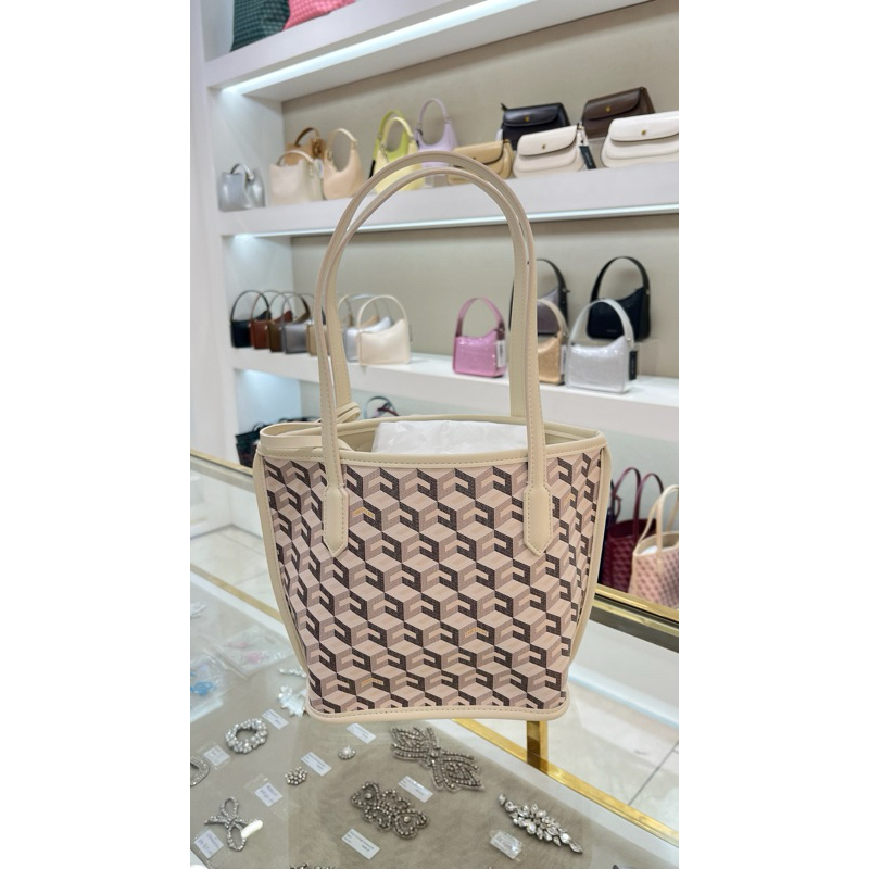 tas christy ng