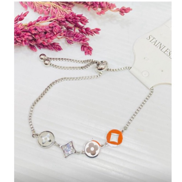 gelang serut titanium bunga silver