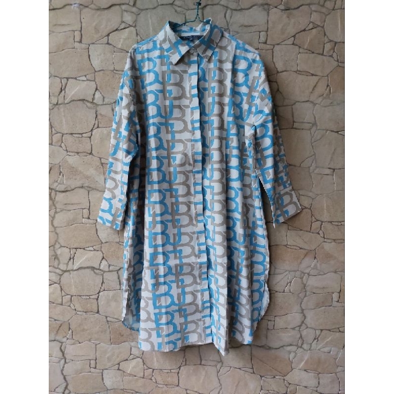 Tunik monogram benang jarum