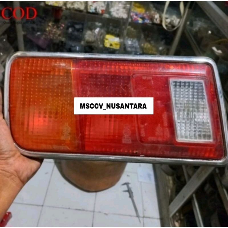 Lampu belakang LH KIRI DAIHATSU Charade original