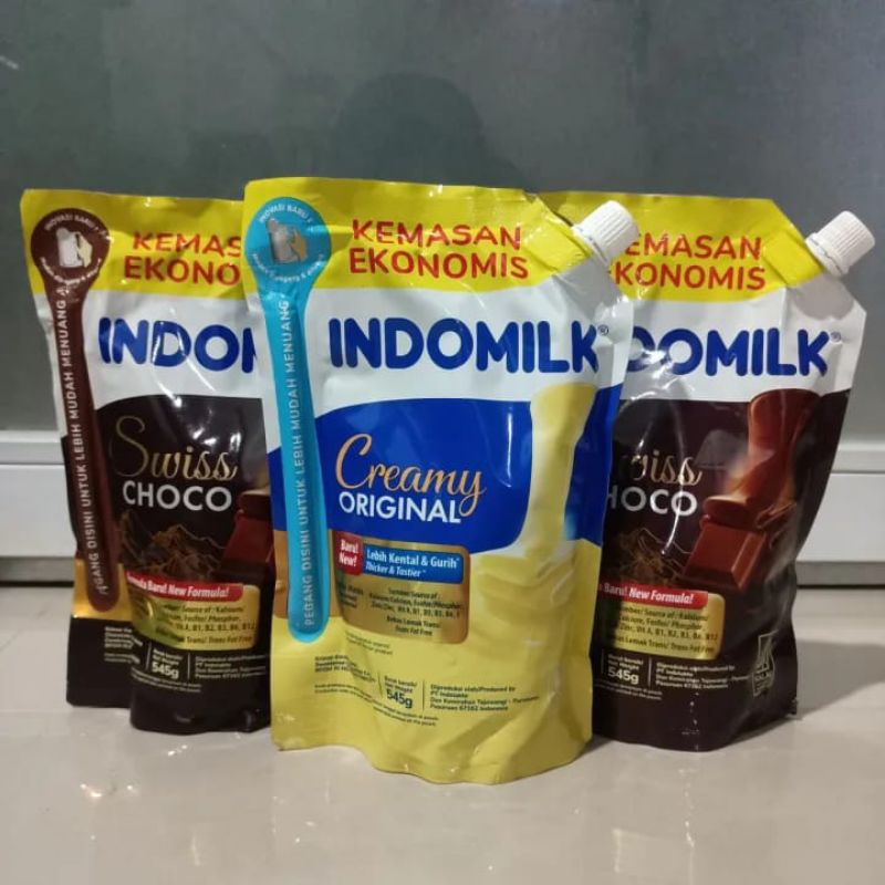 

indomilk susu kental manis kemasan pouch ekonomis 545g ml-indomilk kental manis pouch 545gr