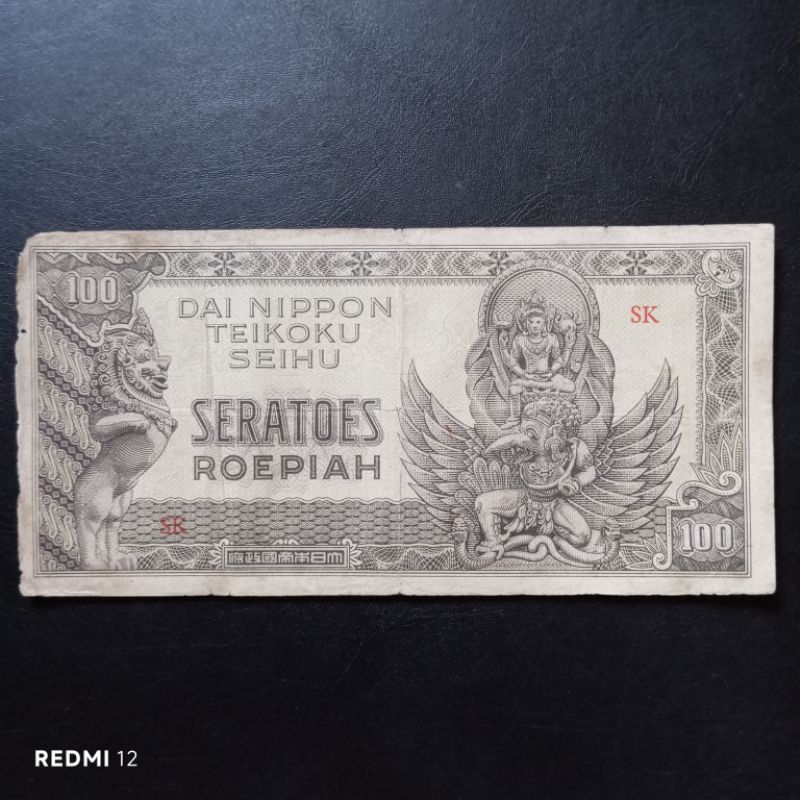 uang kertas kuno 100 rupiah dai nippon garuda wisnu tahun 1943 bekas asli