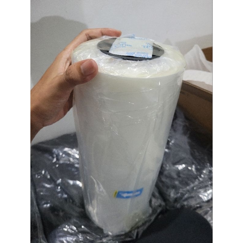 

PET FILM DTF 33CM ULTRA PREMIUM DIJAMIN KUALITAS TERBAIK HOTPEEL GLOSSY