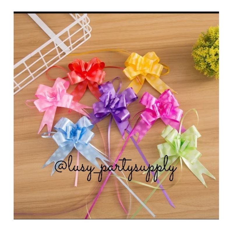 

pita tarik sedang 23mm/ pita serut hiasan parcel souvenir kado pull flower ribbon