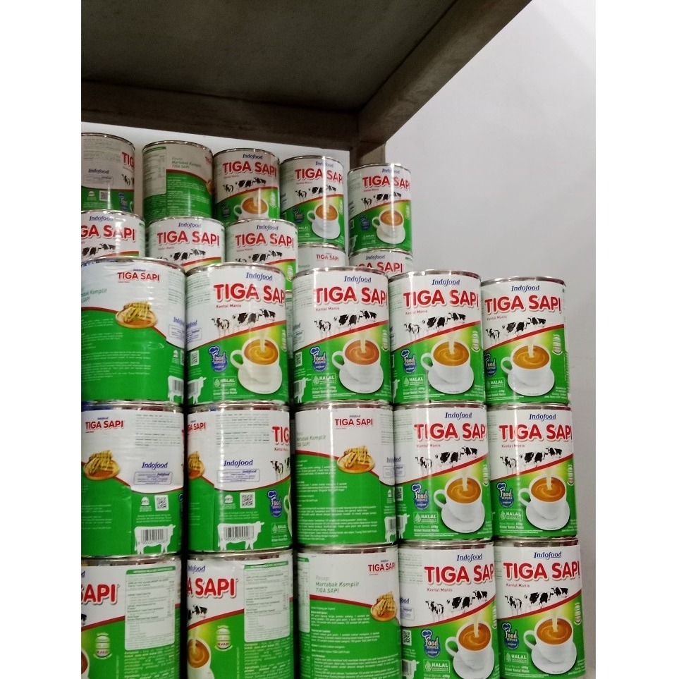

TIGA SAPI Krimer Kental Manis 490g Isi 10 kaleng Paket Usaha Hemat